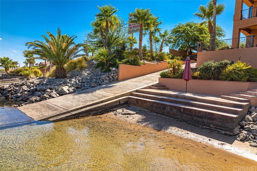 4654 My Place Road Needles, CA 92363 - Photo 8 of 75 a view of a pool with a bench in front of house