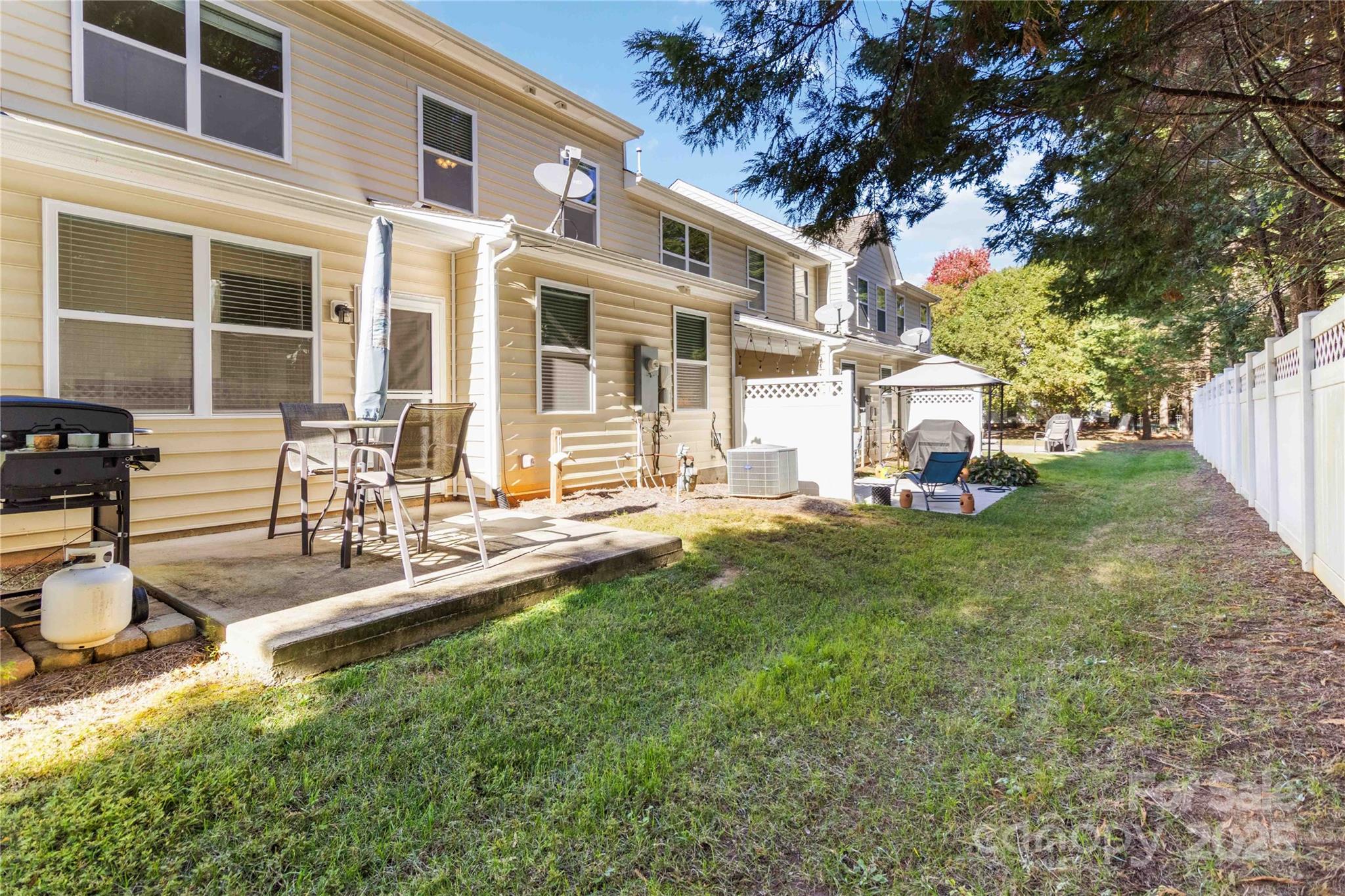 490 Clouds Way Rock Hill, SC 29732 - Photo 27 of 29 a view of a house with a yard patio and fire pit