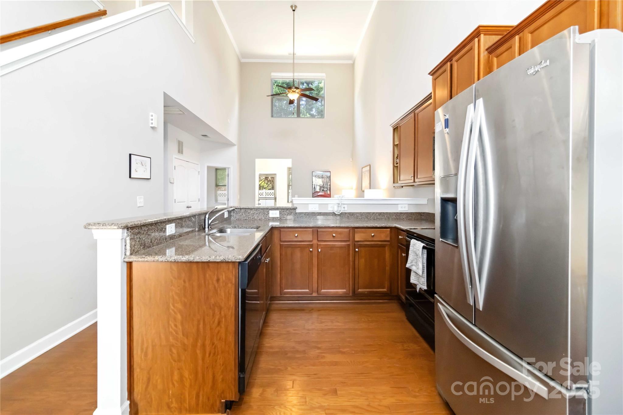 490 Clouds Way Rock Hill, SC 29732 - Photo 9 of 29 a kitchen with stainless steel appliances granite countertop a sink a refrigerator and a stove