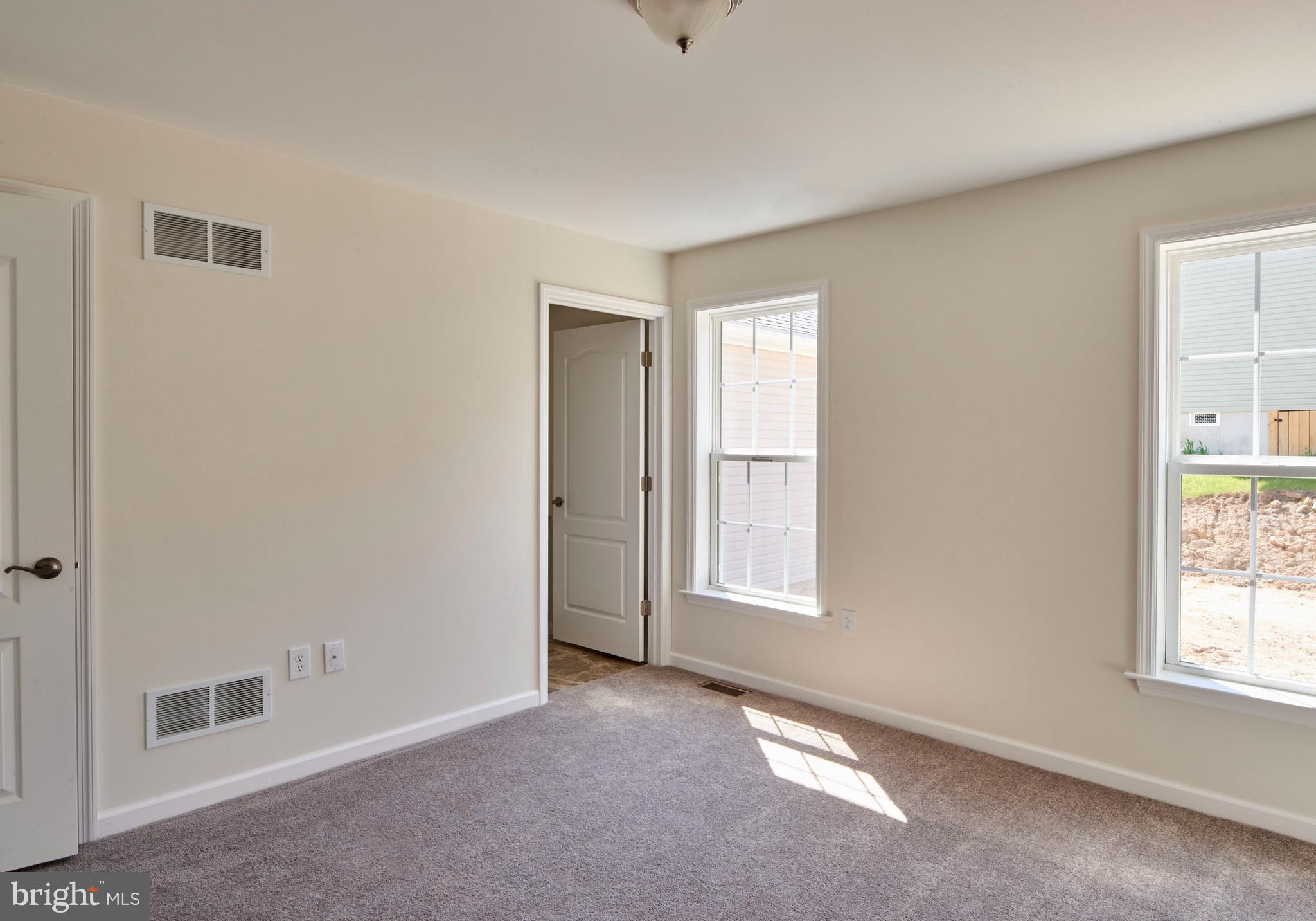 192 Timberwood Trail Centre Hall, PA 16828 - Photo 11 of 20 an empty room with windows