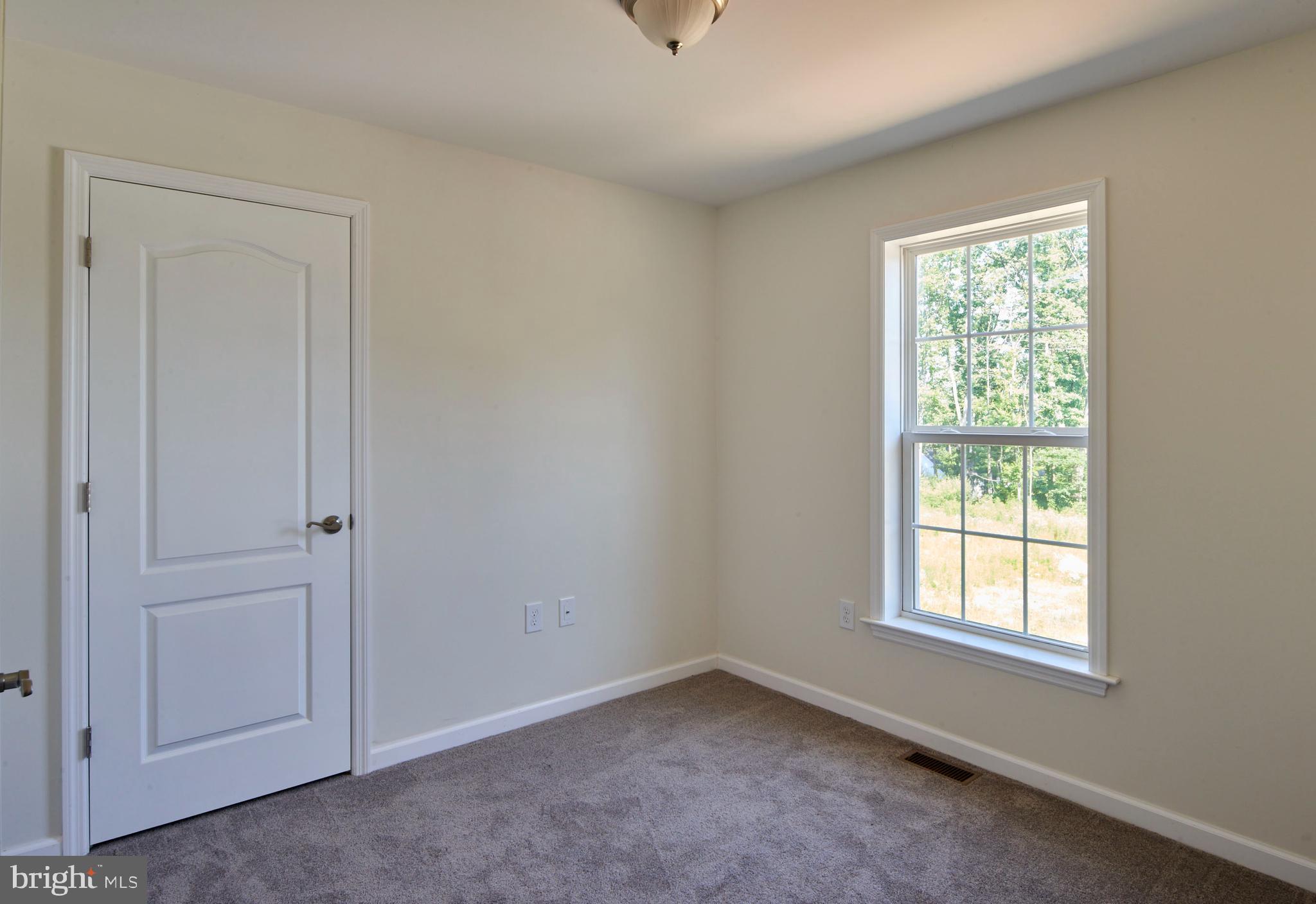 192 Timberwood Trail Centre Hall, PA 16828 - Photo 14 of 20 a view of a livingroom with a window and a ceiling fan