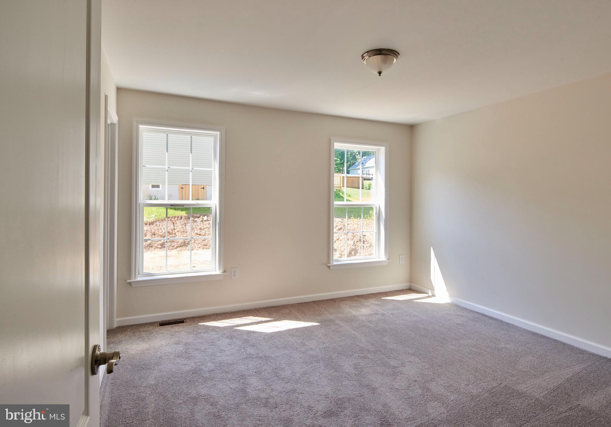 192 Timberwood Trail Centre Hall, PA 16828 - Photo 10 of 20 an empty room with windows