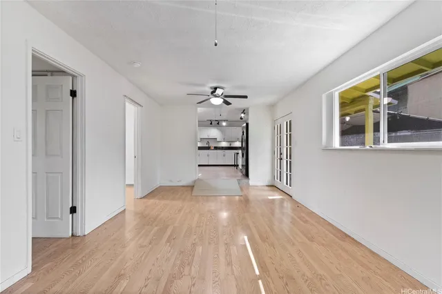 a view of an empty room with a window