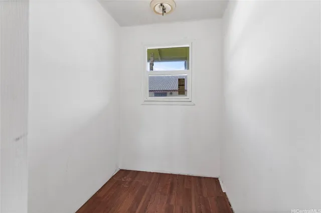 a room with a mirror and vanity