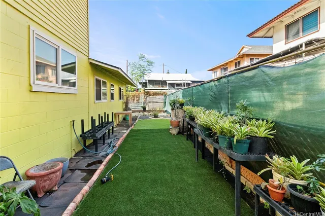 a backyard of a house with lots of green space