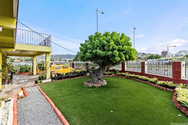 a garden view with a seating space