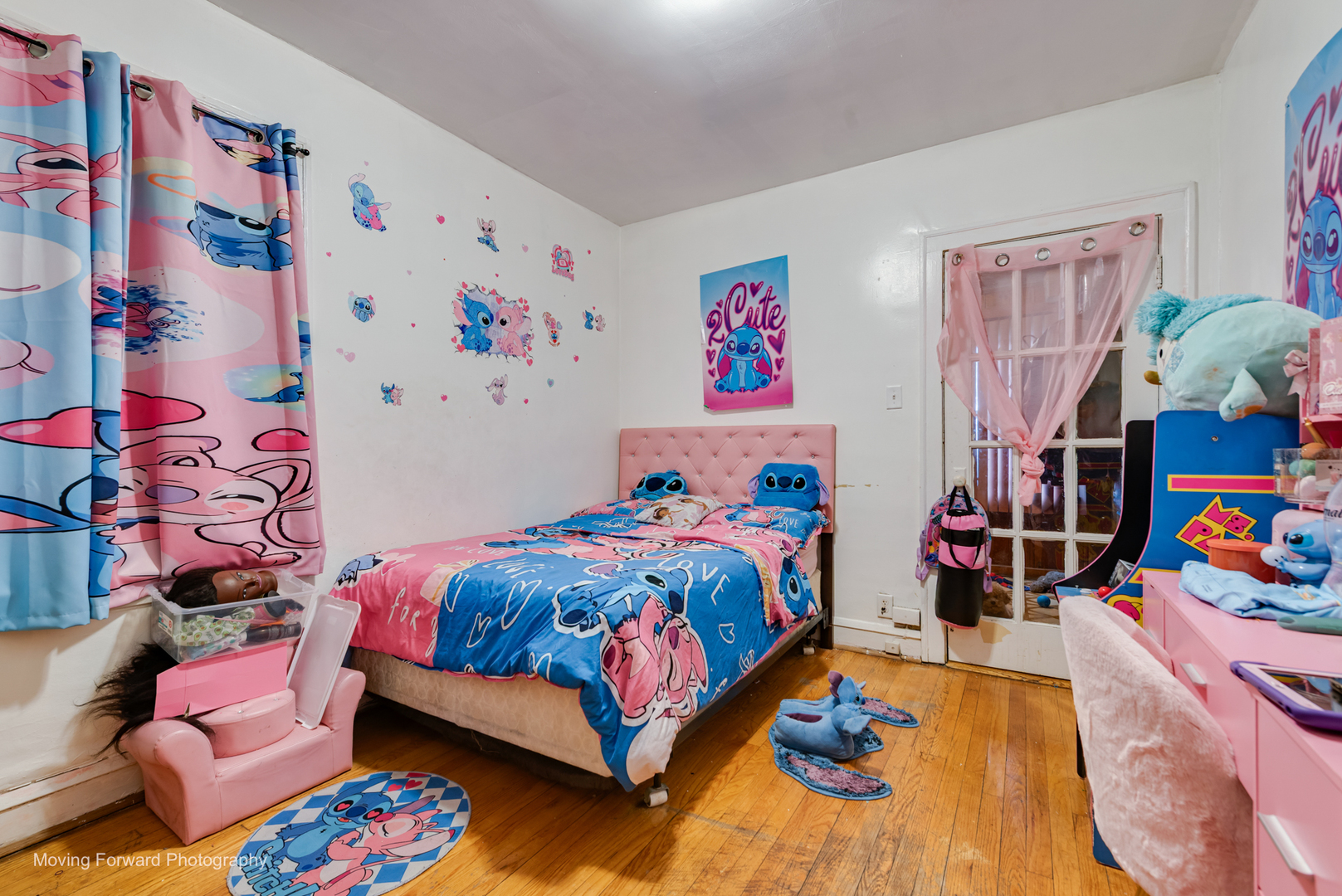 8213 South Indiana Avenue Chicago, IL 60619 - Photo 8 of 25 a bedroom with bed and a couch