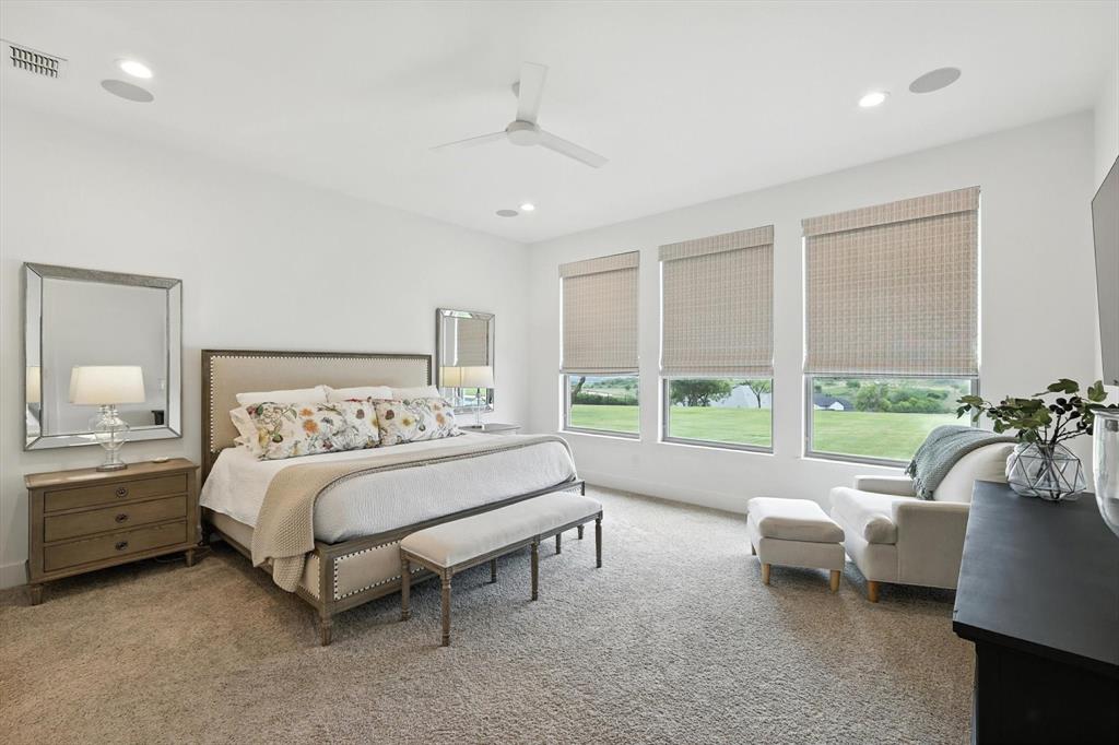 148 Overlook Drive Aledo, TX 76008 - Photo 18 of 40 a bed room with a bed and a couch