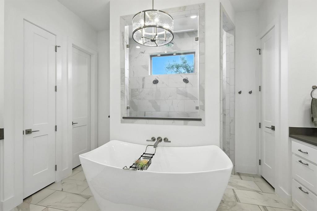 148 Overlook Drive Aledo, TX 76008 - Photo 20 of 40 a bathroom with a bathtub and shower