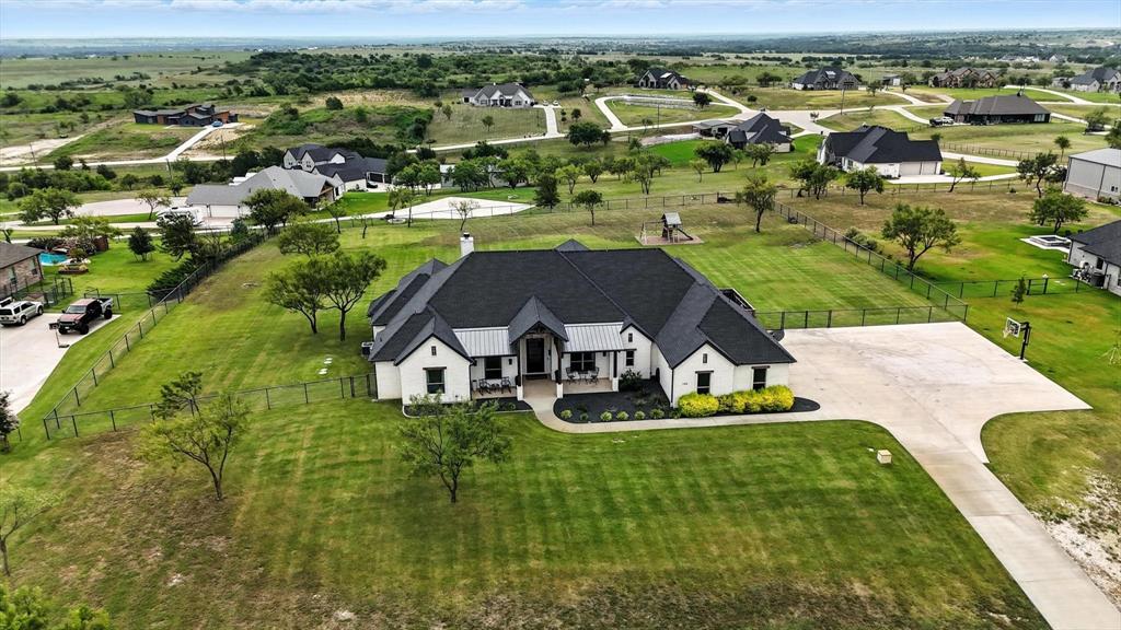148 Overlook Drive Aledo, TX 76008 - Photo 39 of 40 an aerial view of residential houses with outdoor space and trees