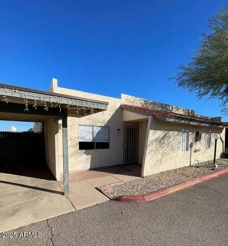 a view of a house with a garage