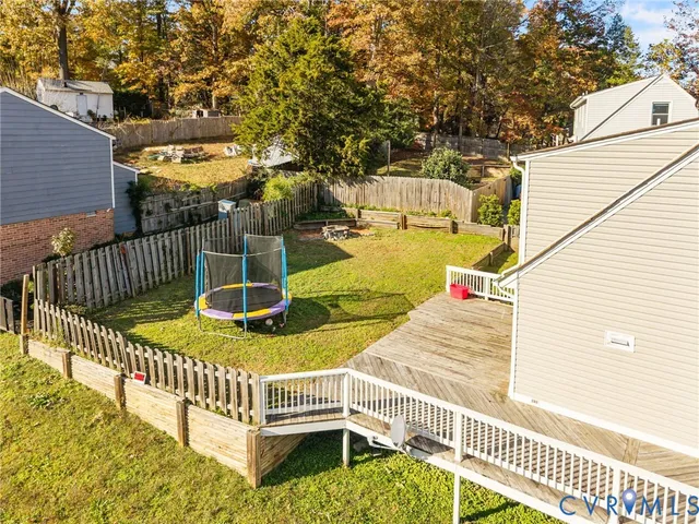 a view of a balcony with wooden fence