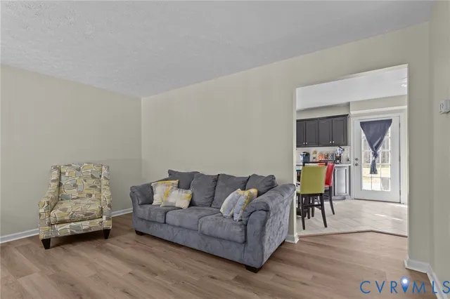 a living room with furniture and a couch