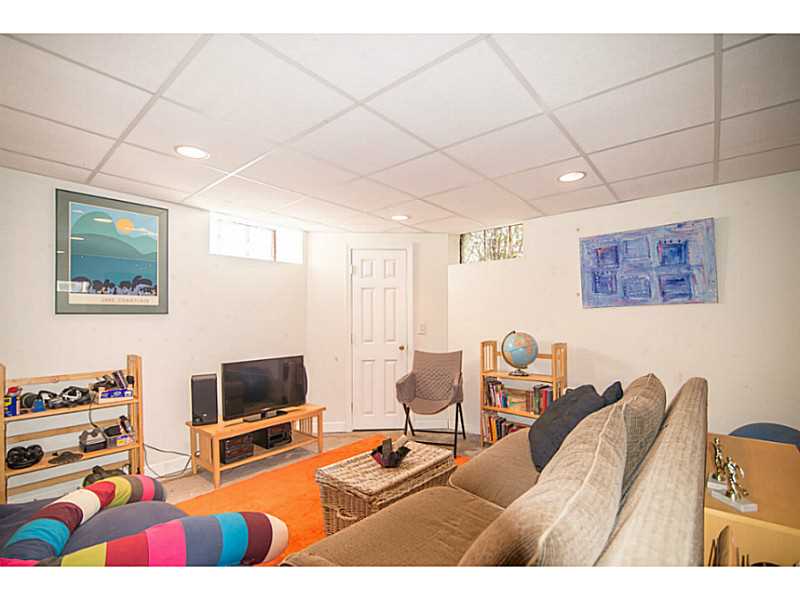65 County Road Barrington, RI 02806 - Photo 19 of 25 Cellar or Basement. TV or playroom with space heater