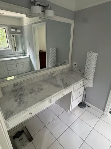 a bathroom with a toilet and a sink