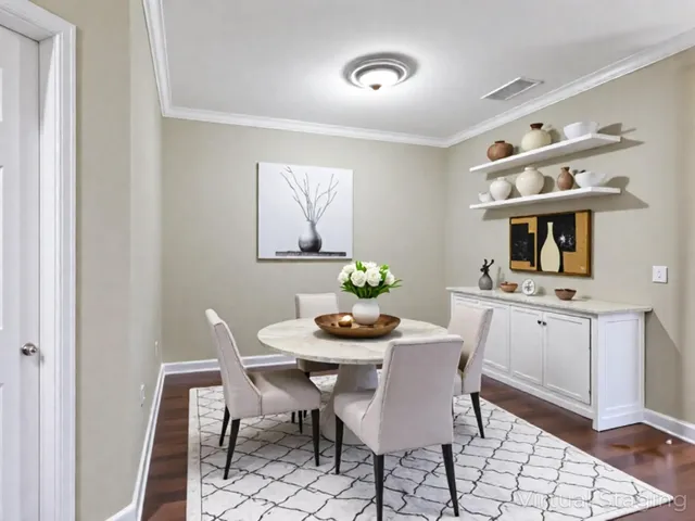 a dining room with furniture and window
