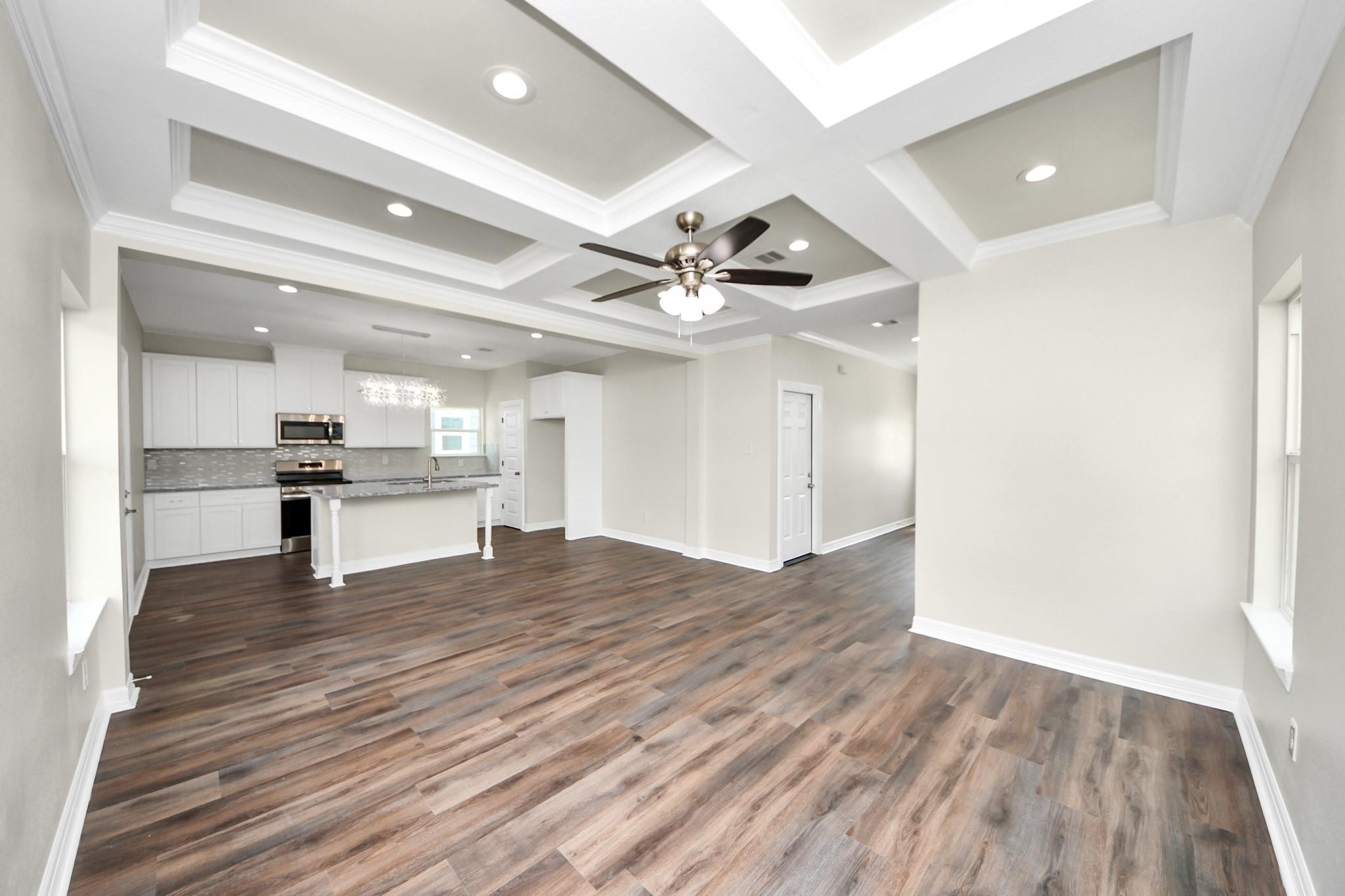 422 North 4th Street Beasley, TX 77417 - Photo 14 of 30 a view of kitchen with refrigerator microwave and stove