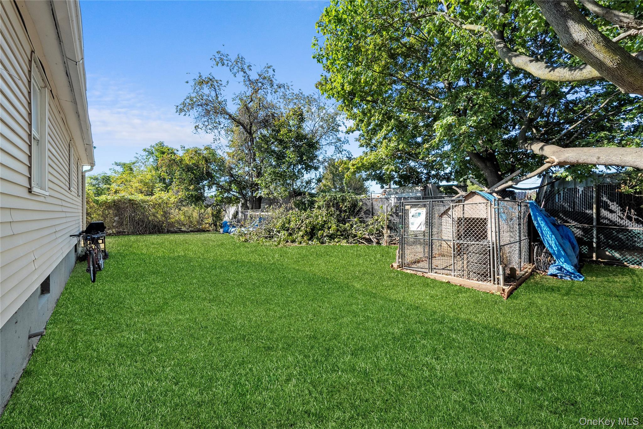 1739 Harrison Avenue Bay Shore, NY 11706 - Photo 4 of 15 a view of a house with a yard porch and sitting area