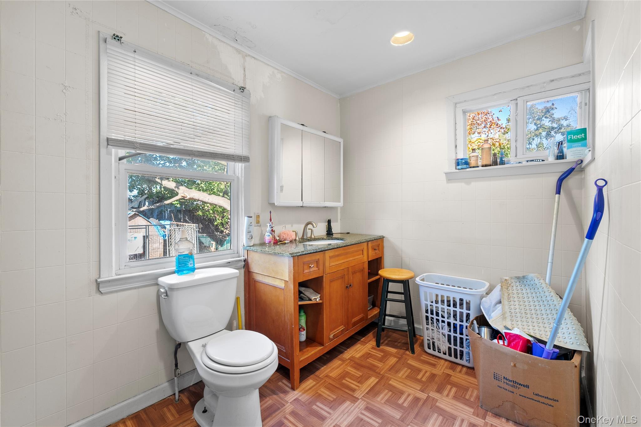 1739 Harrison Avenue Bay Shore, NY 11706 - Photo 9 of 15 a room with furniture a rug and a window