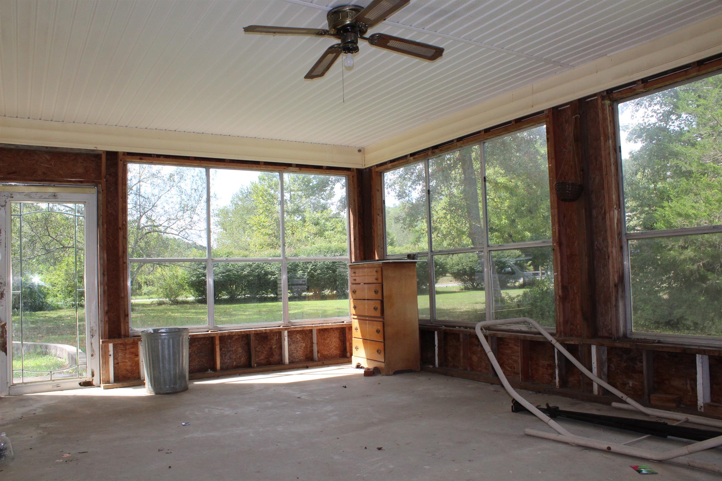 932 CCC Road McEwen, TN 37101 - Photo 18 of 30 a view of a room with gym equipment and large windows