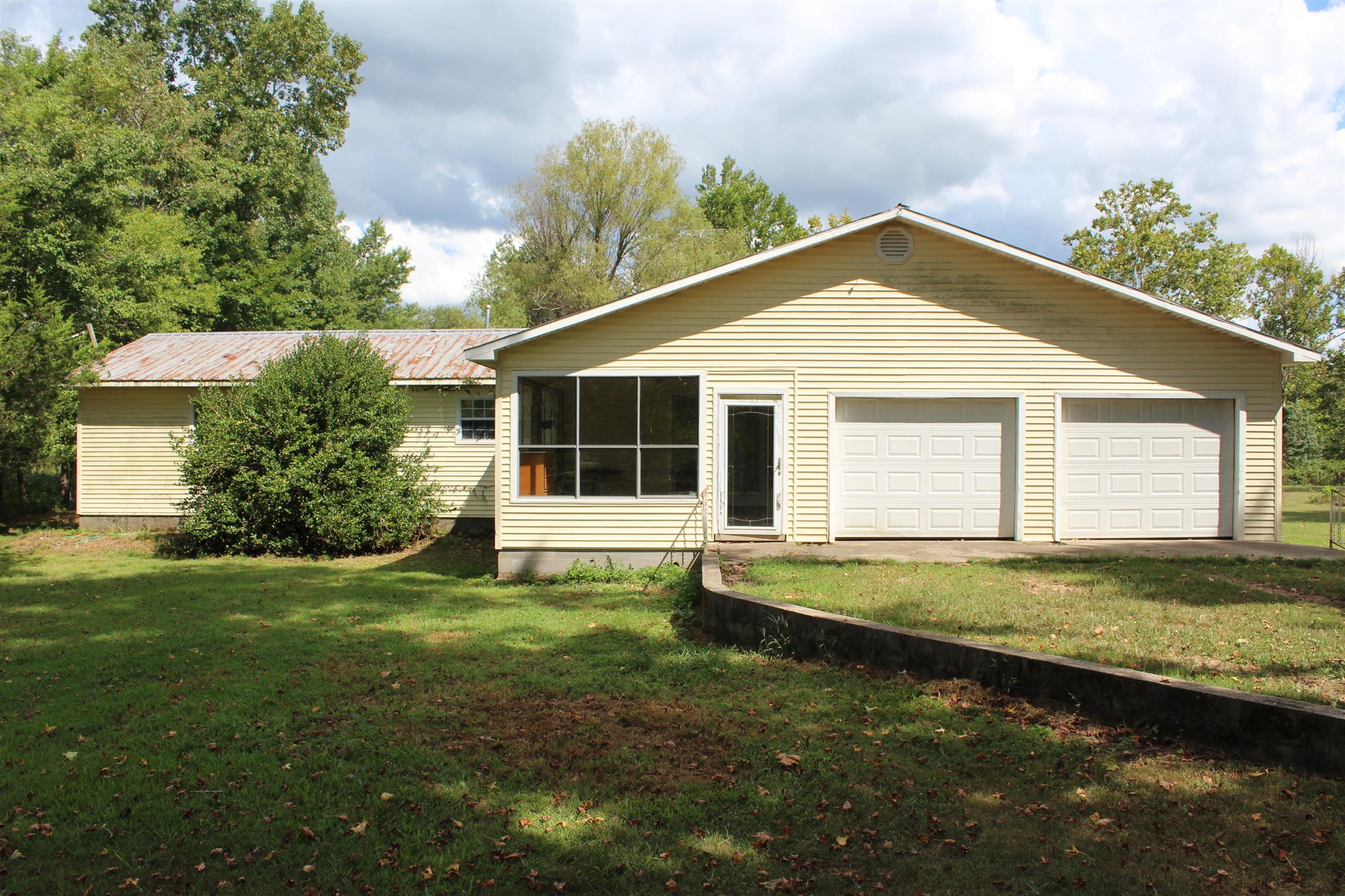 932 CCC Road McEwen, TN 37101 - Photo 5 of 30 a view of a house with a yard