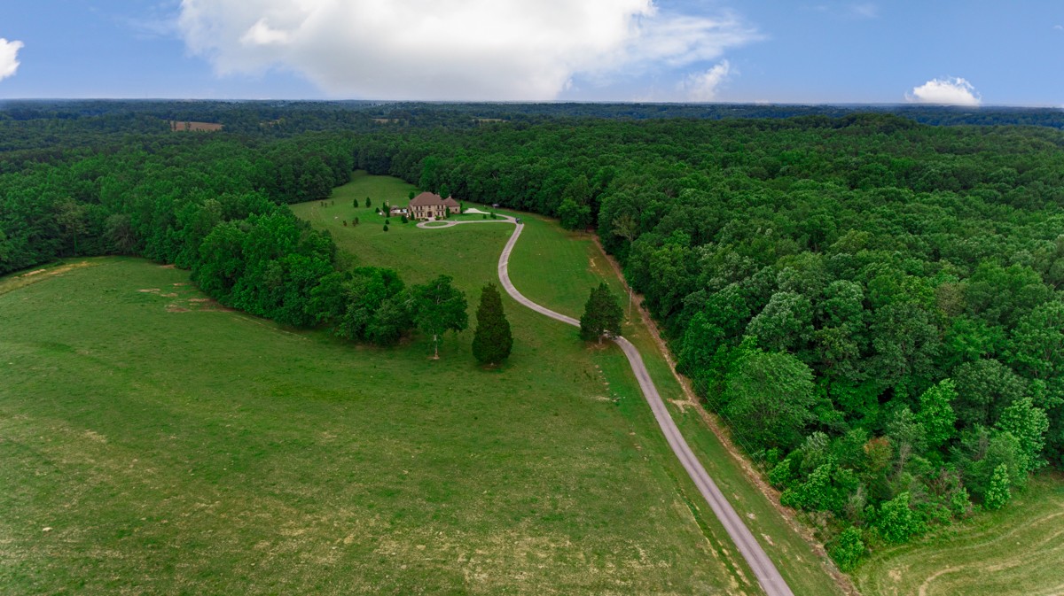 7195 Barker Road Athens, AL 35614 - Photo 14 of 49 a view of a golf course with a garden