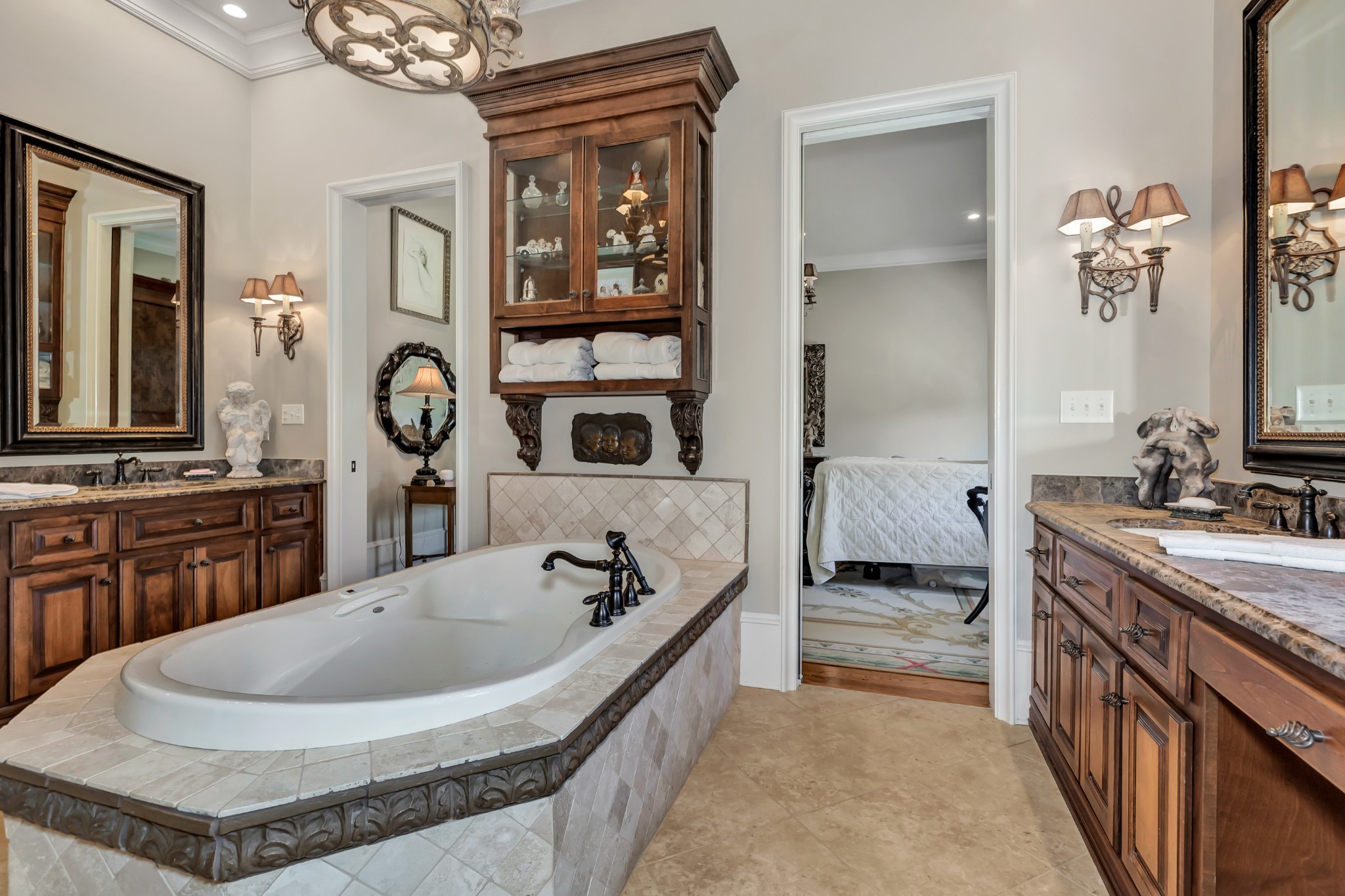7195 Barker Road Athens, AL 35614 - Photo 39 of 49 a bathroom with a tub sink and mirror