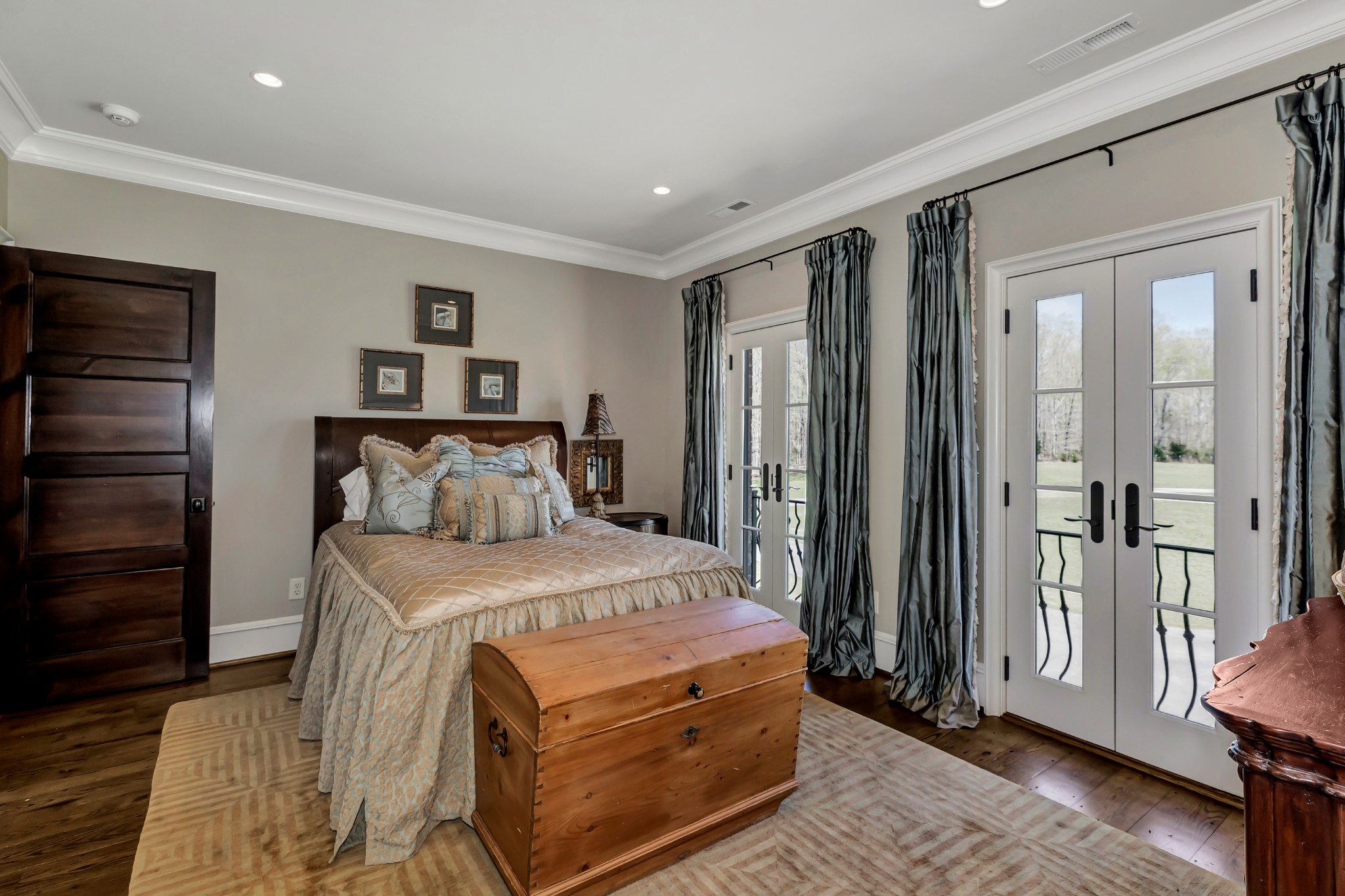 7195 Barker Road Athens, AL 35614 - Photo 44 of 49 a bedroom with a bed and a mirror