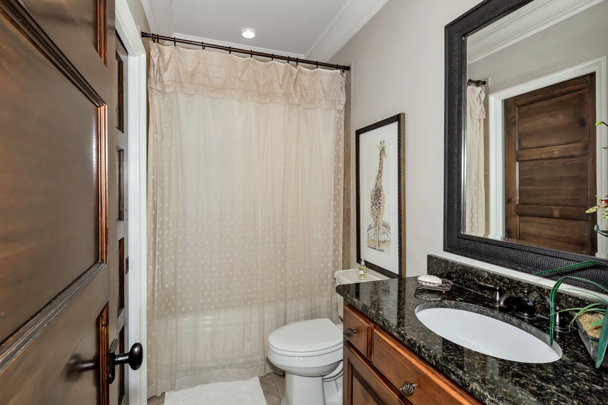7195 Barker Road Athens, AL 35614 - Photo 45 of 49 a bathroom with a granite countertop sink toilet and shower