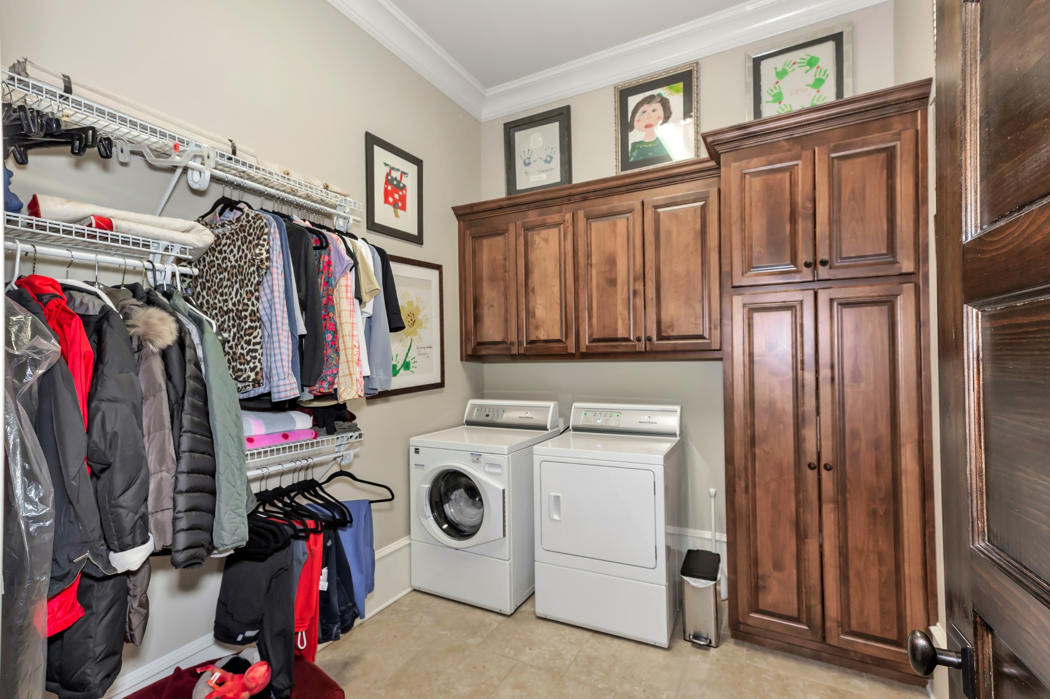7195 Barker Road Athens, AL 35614 - Photo 46 of 49 a view of walk in closet with clothes and shoes