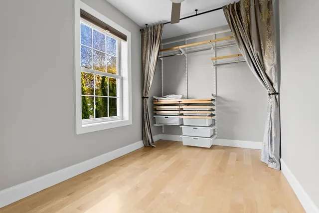 a view of room with stairs and a window