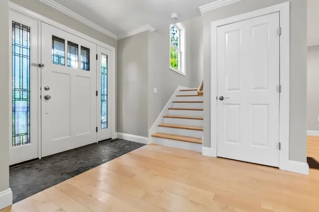 a view of an entryway with stairs