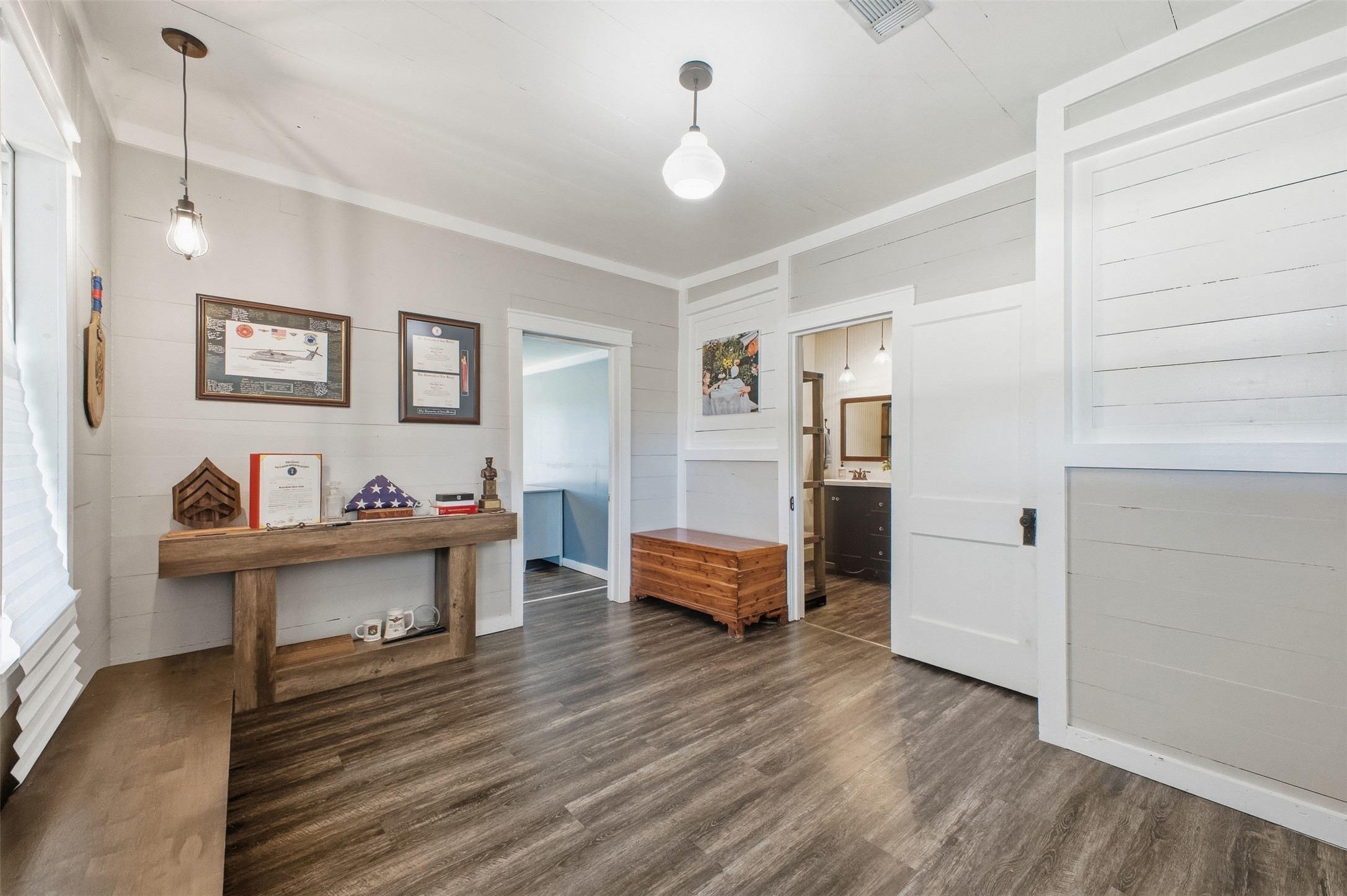 1903 Tigerpoint Road Brenham, TX 77833 - Photo 3 of 27 a view of a livingroom with furniture and wooden floor