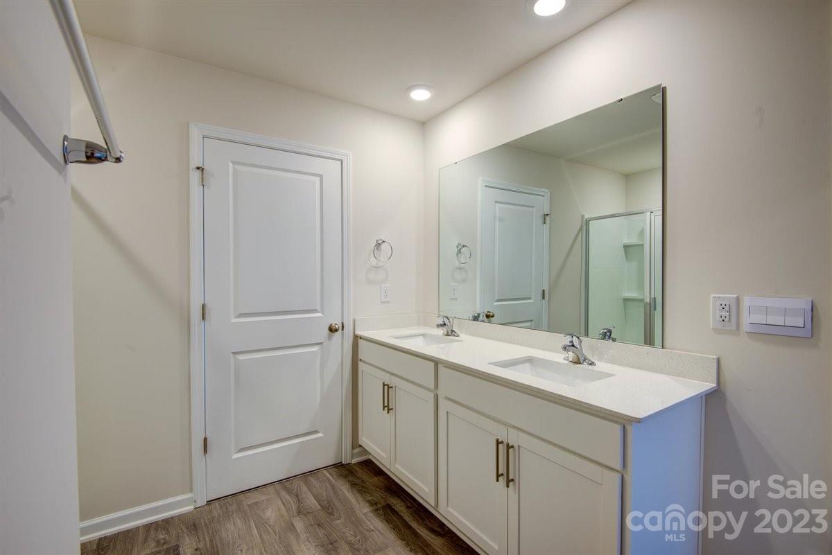 220 Jackson Way Lexington, NC 27295 - Photo 12 of 33 a view of bathroom with a sink and mirror