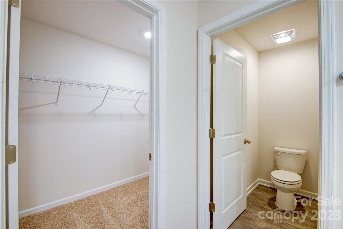 220 Jackson Way Lexington, NC 27295 - Photo 13 of 33 a bathroom with a toilet and a shower