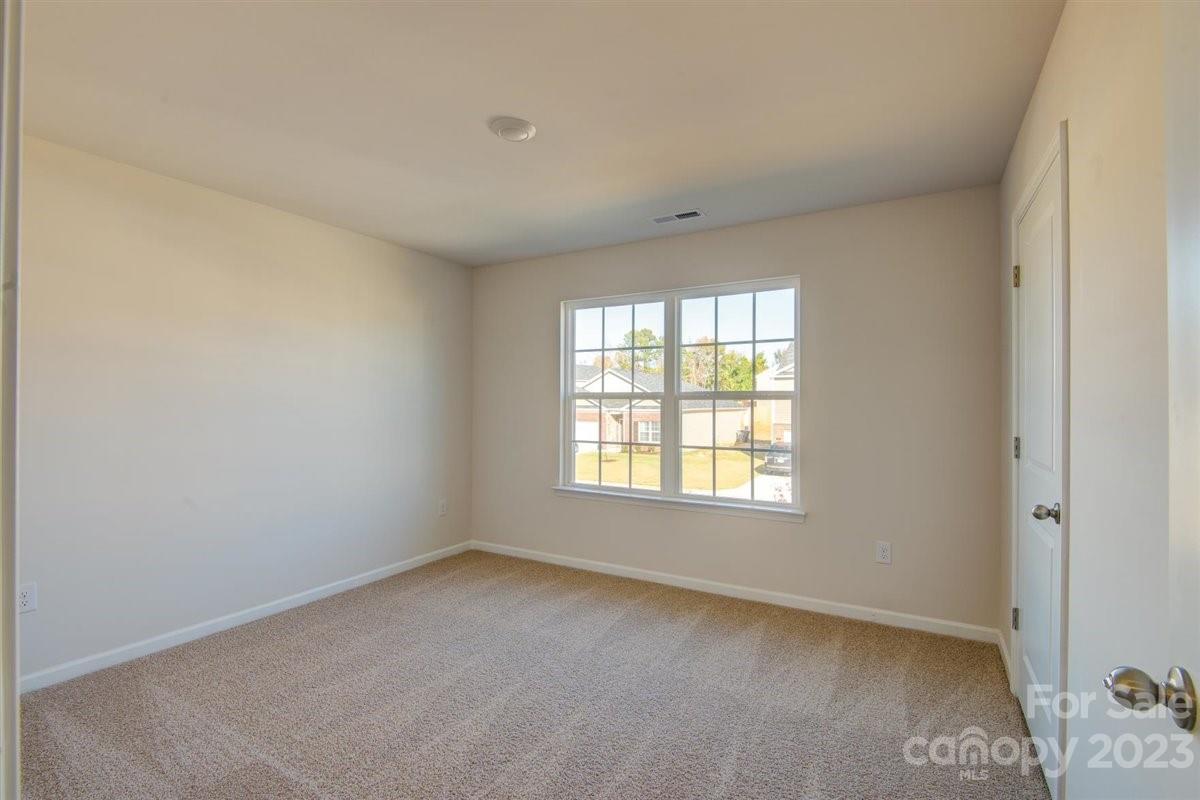220 Jackson Way Lexington, NC 27295 - Photo 14 of 33 an empty room with a window