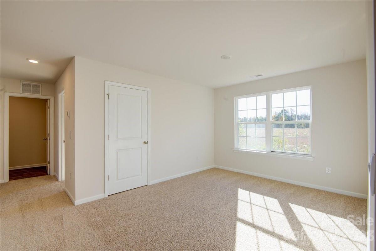 220 Jackson Way Lexington, NC 27295 - Photo 22 of 33 a view of an empty room with a window