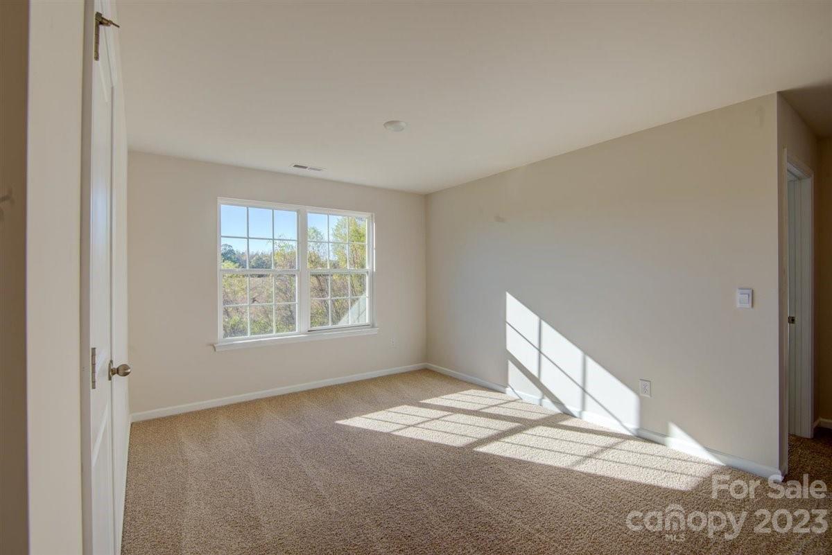 220 Jackson Way Lexington, NC 27295 - Photo 23 of 33 a view of empty room with window