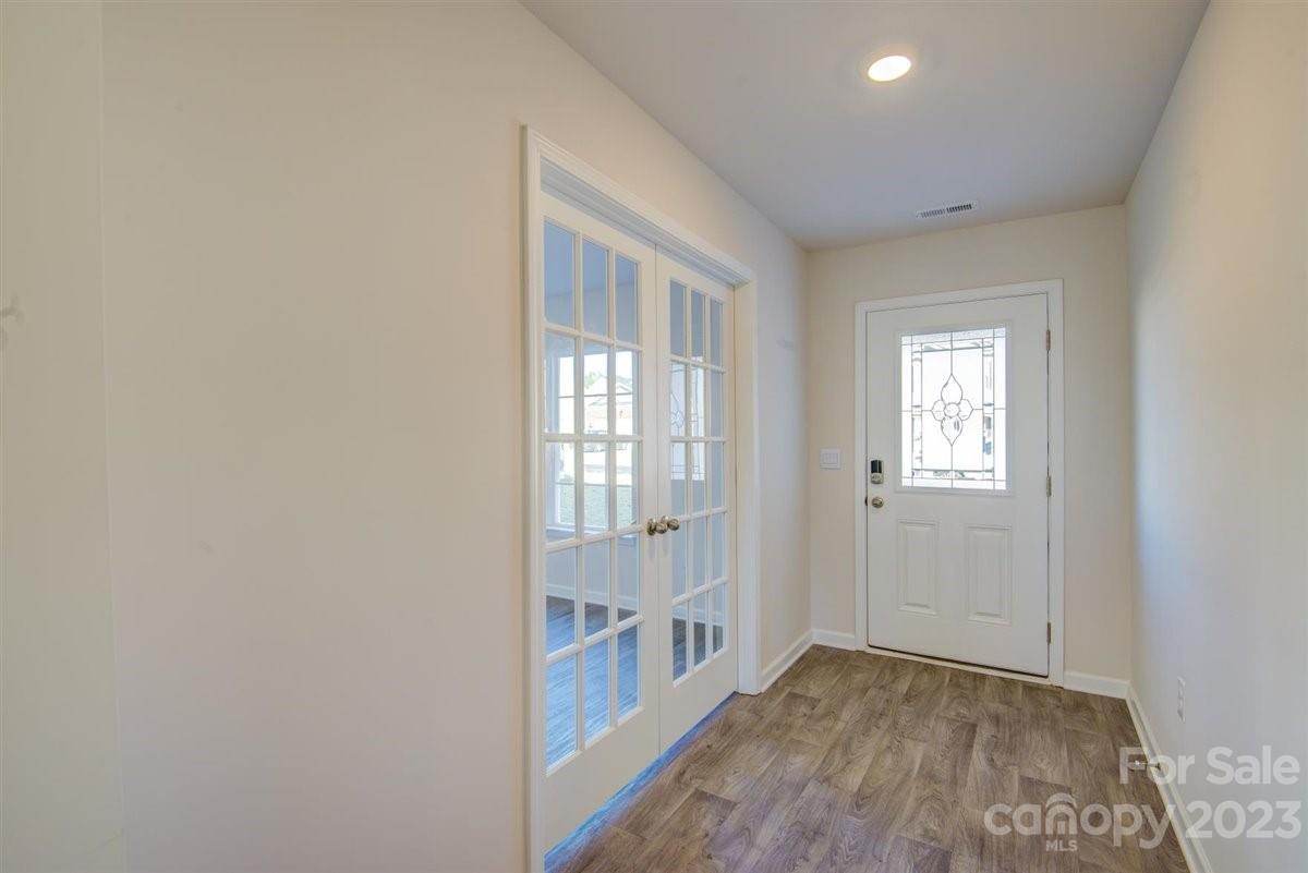 220 Jackson Way Lexington, NC 27295 - Photo 5 of 33 a view of an empty room with glass door