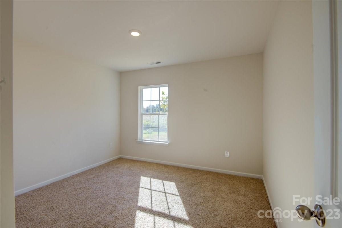 220 Jackson Way Lexington, NC 27295 - Photo 6 of 33 a view of an empty room with a window
