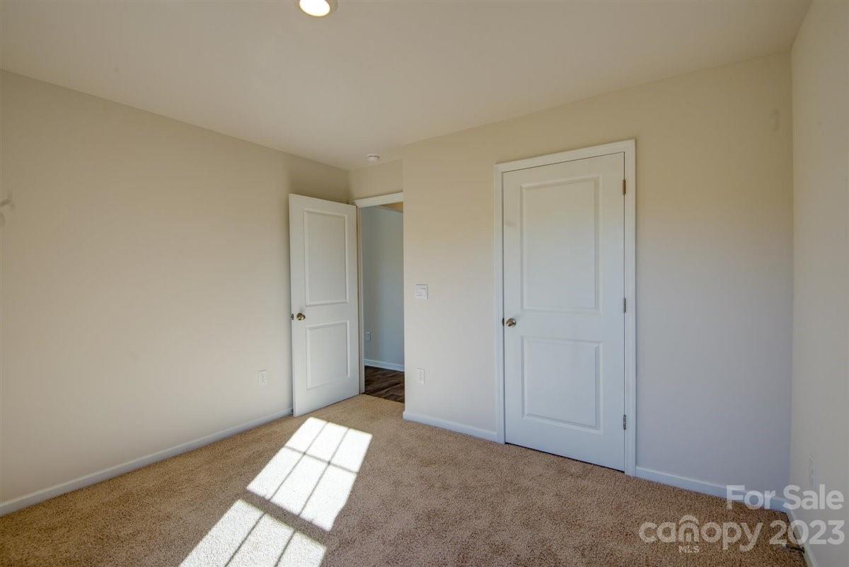 220 Jackson Way Lexington, NC 27295 - Photo 7 of 33 a view of an empty room and wooden floor