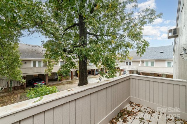 a view of a house with a sink and a yard