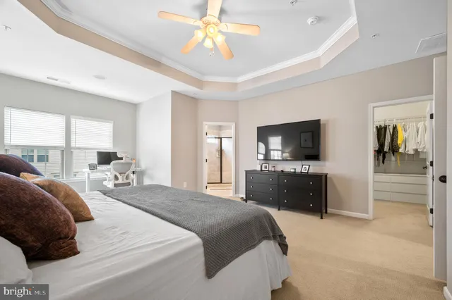 a view of a hallway with a chandelier