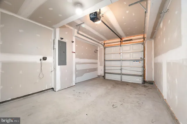 a front view of a building with a lake view