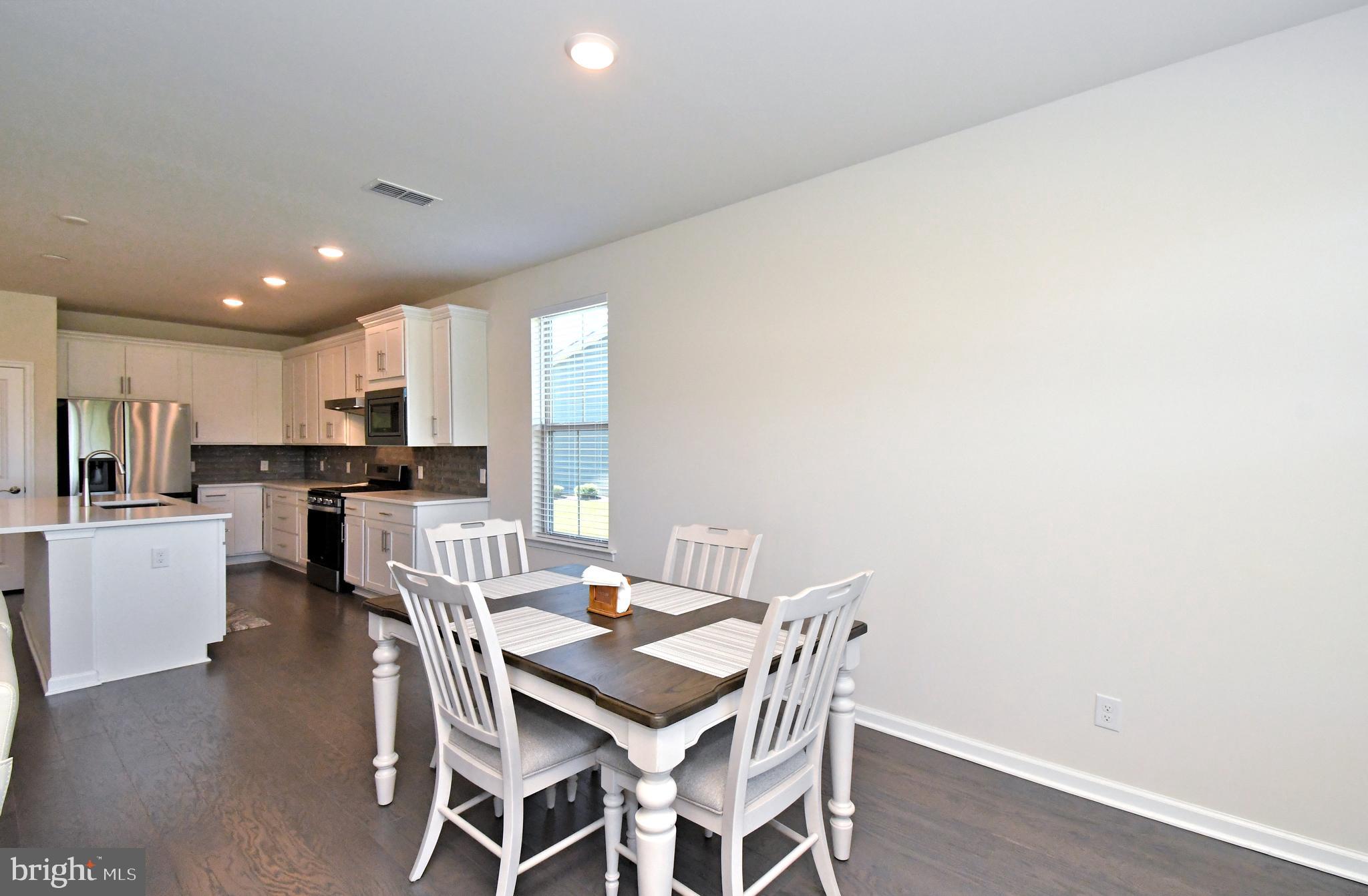 1024 Wright Street Hatfield, PA 19440 - Photo 11 of 68 a view of a dining room with furniture and wooden floor