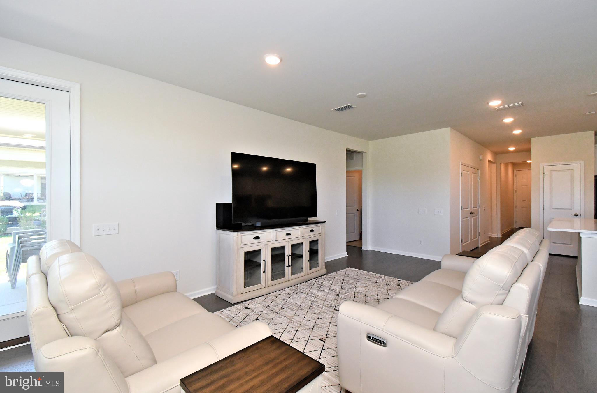 1024 Wright Street Hatfield, PA 19440 - Photo 15 of 68 a living room with furniture and a flat screen tv