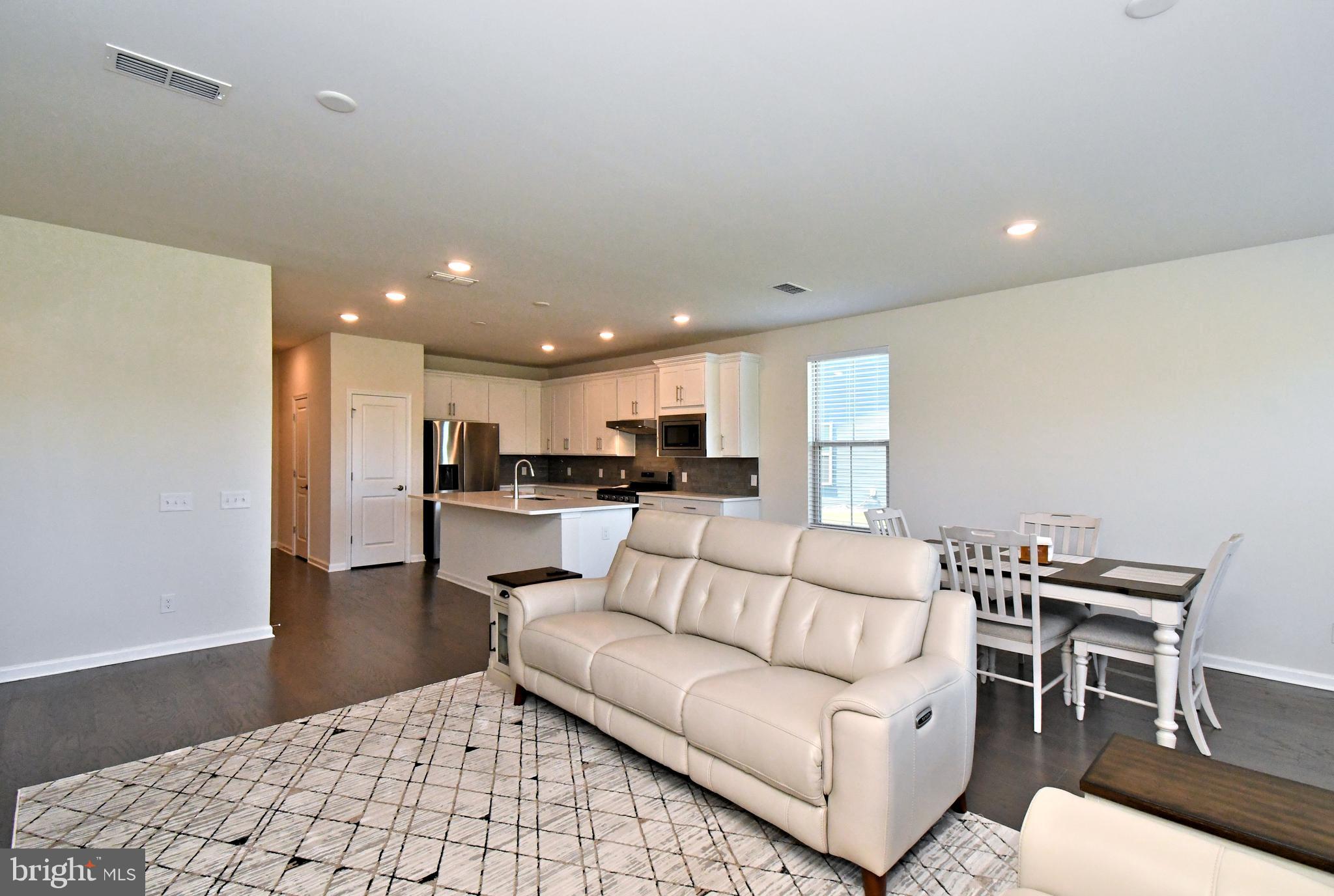 1024 Wright Street Hatfield, PA 19440 - Photo 16 of 68 a living room with furniture and kitchen view