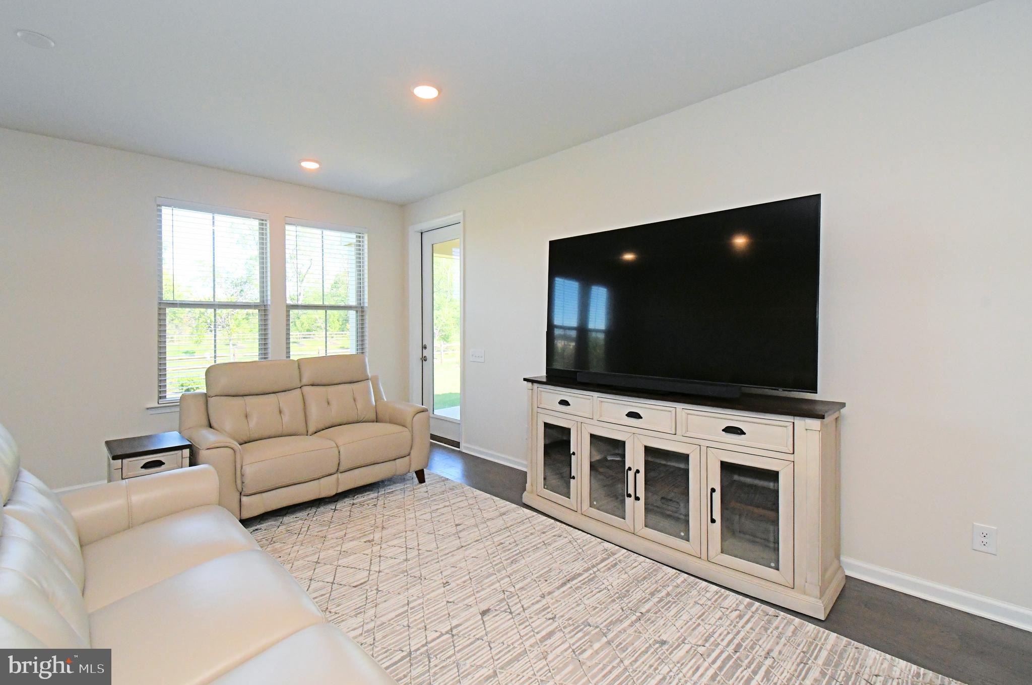 1024 Wright Street Hatfield, PA 19440 - Photo 17 of 68 a living room with furniture and a flat screen tv