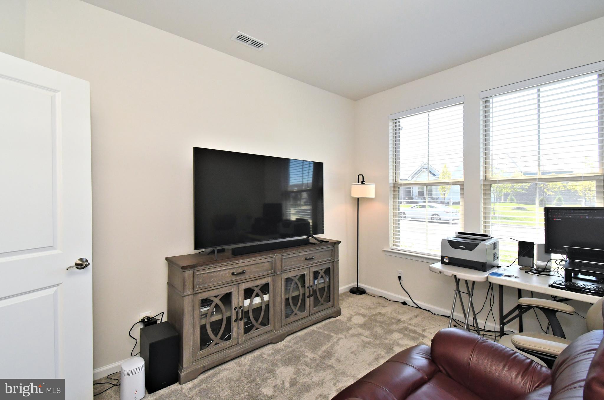 1024 Wright Street Hatfield, PA 19440 - Photo 21 of 68 a living room with furniture and a flat screen tv