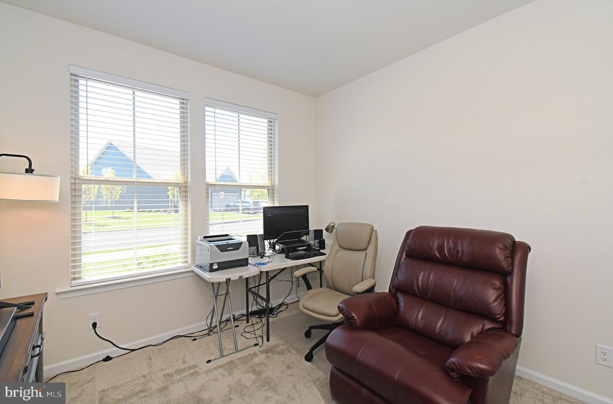 1024 Wright Street Hatfield, PA 19440 - Photo 22 of 68 a view of a workspace with a window and couch